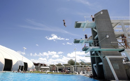 Rick Egan  | The Salt Lake Tribune
Kids leap off the 10-meter platform high dive at Oquirrh Park Fitness Center in Kearns.