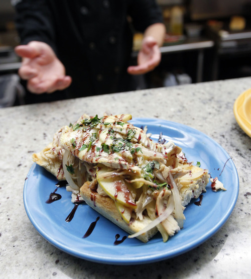 Al Hartmann | The Salt Lake Tribune
Avenues Bistro on Third's Old Ave Special sandwich features turkey with brie cheese and apple slices.