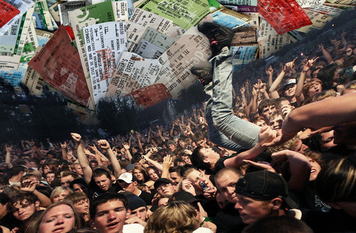 Photo illustration by Francisco Kjolseth  I  The Salt Lake Tribune
Ticket to ride: The first show. (Crowd photo at the AFI concert at the Utah State Fair Park by Ryan Galbraith.)

 