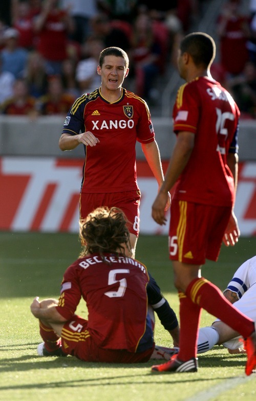 Kim Raff | The Salt Lake Tribune
Real Salt Lake player Will Johnson celebrates with (ground) Kyle Beckerman after a call in the box that lead to a penalty kick against Vancouver at Rio Tinto Stadium in Sandy, Utah on July 27, 2012.