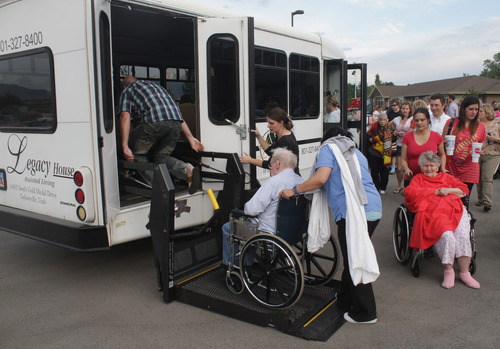 Rick Egan  | The Salt Lake Tribune 

Residents of the Legacy Village care center in Kearns, are loaded into a van to go to the Legacy House in Taylorsville for the night, Monday, July 30, 2012.