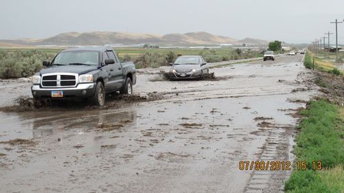 This photo tweeted by the Sanpete County Sheriff's Office shows flooding on State Road 132 on July 30, 2012.