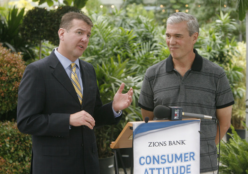 Rick Egan  | The Salt Lake Tribune 

Randy Shumway, (left) CEO of The Cicero Group/Dan Jones and Associates, gives the monthly Consumer Attitude Index for Zion's Bank  along with Scott Pynes, owner of Cactus and Tropicals, Tuesday, July 31, 2012.