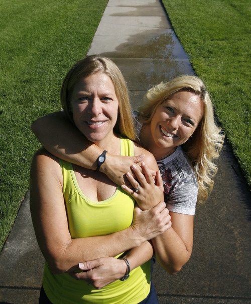 Scott Sommerdorf  |  The Salt Lake Tribune             
Kathy Merrill, left, and her daughter Jill pose, Monday July 30, 2012 in Layton. They will be running in the Devil Dash 