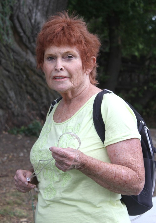 Rick Egan  |  The Salt Lake Tribune 

Anita Bradford uses a backpack to carry her oxygen whenever she is outside. Ash-laden smoke billowing from the Wood Hollow Fire over Bradford's Spanish Fork home forced her to spend a week in California to avoid worsening her lung disease.