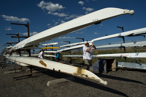 Chris Detrick  |  The Salt Lake Tribune
Joe Ozimek and Susan Thomas carry out a sculling boat at the Great Salt Lake Marina Tuesday July 17, 2012.