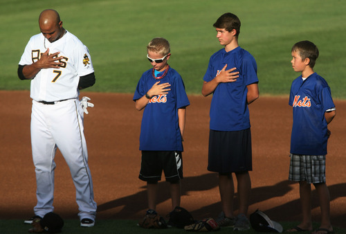 Steve Griffin | The Salt Lake Tribune


Members of a Lehi, Utah junior baseball team stand with Bees infielder Luis Jimenez during the National Anthem before game between the Bees and the New Orleans Zephyrs at Spring Mobile Ballpark in Salt Lake City, Utah Wednesday August 1, 2012. The younger players got to take the field with the big league players during introductions.