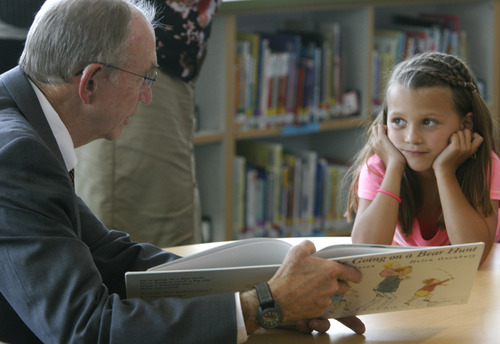Rick Egan  | The Salt Lake Tribune 

David Hardman reads to second Grader, Sydnee Hall at Foxboro Elementary, in North Salt Lake, Tuesday, July 31, 2012.  Gov. Herbert and leaders of Prosperity 2020 announced an initiative to get more business volunteers in schools.