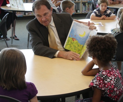Rick Egan  | The Salt Lake Tribune 

Gov. Herbert (left) reads to second grade students at Foxboro Elementary, in North Salt Lake, Tuesday, July 31, 2012.  Gov. Herbert and leaders of Prosperity 2020 announced an initiative to get more business volunteers in schools.