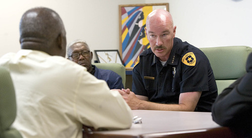 Paul Fraughton | Salt Lake Tribune
Salt Lake City Chief of Police Chris Burbank meets with Rev France Davis of Calvary Baptist Church to discuss  the circumstances leading to the death  of Allen Nelson who died while in police custody.  Present at the meeting at Calvary Baptist were Robert Comstock, James Green,to the right of Chief Burbank, Police Sgt. Fred Ross,  Rev Harold Fields and Rev. Nurjhan B. Govan. 
 Thursday, August 2, 2012