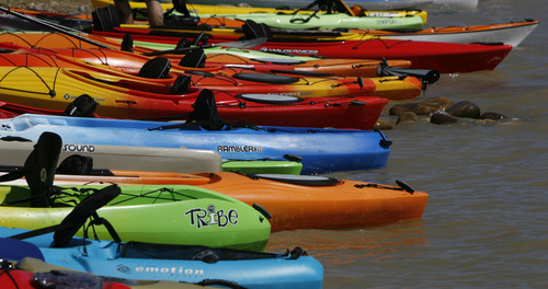 Francisco Kjolseth  |  The Salt Lake Tribune
The Open Air Demo Day takes to the water Wednesday, kicking off the Outdoor Retailer Summer Market at Jordanelle State Park. More than 150 outdoor brands and many more retailers are at the reservoir to show off and experience first-hand the new gear coming out for summer 2013.