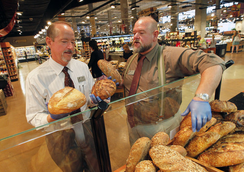 Al Hartmann  |  The Salt Lake Tribune	
Brothers Bob, left, and Randy Harmon, co-owners of Harmons Grocery Stores will be celebrating the chains 80th anniversary.  They check out some of the fresh baked breads at the newest Harmons Grocery Store at  City Creek Center in Salt Lake City.