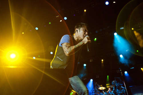 Arnel Pineda of Journey performs during a concert Saturday Aug. 6