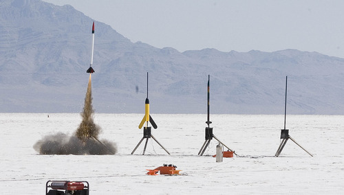 Paul Fraughton | Salt Lake Tribune
A rocket leaves the launching pad at the Utah Rocket Club's Hellfire 2012, an annual rocket launch  held on the Bonneville Salt Flats near Wendover.
 Friday, August 3, 2012