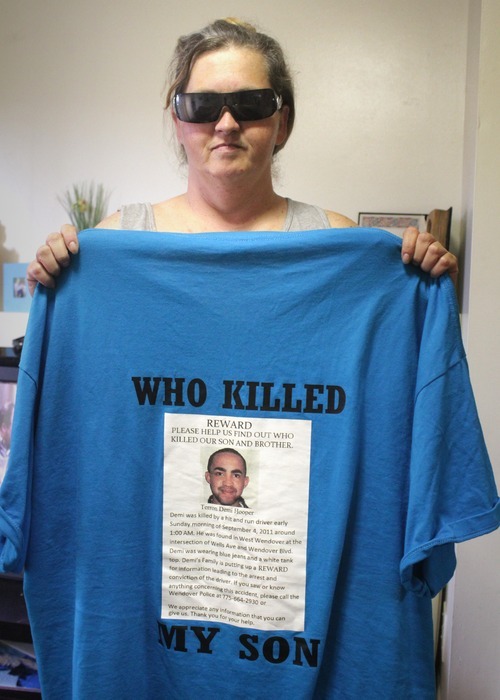 Rick Egan  | The Salt Lake Tribune 

Shasta Hooper holds the shirt that she wears when she goes to West Wendover to find to who killed her son, Wednesday, August 1, 2012. It's been almost a year since Terron Hooper was run down outside of a West Wendover casino while celebrating his birthday with friends. His killer remains at large