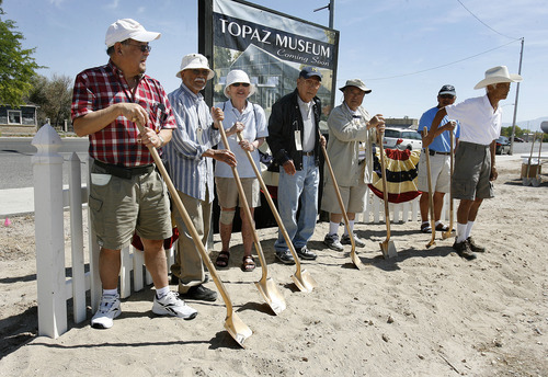 Scott Sommerdorf  |  The Salt Lake Tribune             
Former internees at the Topaz Relocation Camp pose for a picture at the ceremonial groundbreaking for the Topaz Museum and Education Center in Delta, Saturday, Aug. 4, 2012. The museum is being built to remember the nearby Topaz Relocation Camp, where Japanese-Americans were sent during World War II. Willie Ito is at the far left, George Murakami is fourth from the left, and Toru Saito is at the far right.