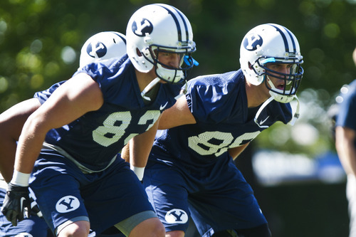 Chris Detrick  |  The Salt Lake Tribune
BYU's Austin Holt, right, and Stehly Reden, during a preseason practice at the BYU outdoor practice field Thursday August 2, 2012.