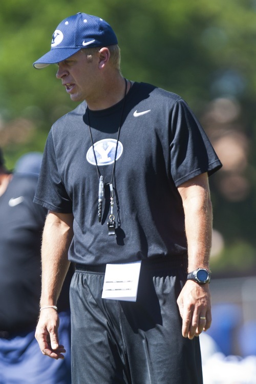 Chris Detrick  |  The Salt Lake Tribune
BYU football head coach Bronco Mendenhall watches during a preseason practice at the BYU outdoor practice field Thursday August 2, 2012.