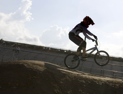 Paul Fraughton | The Salt Lake Tribune
Arielle Martin, who was to represent the U.S. in BMX at the London Olympics, takes a few laps on the RAD Canyon BMX Track in South Jordan, where she raced as a kid.