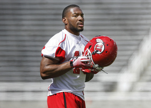 Scott Sommerdorf  |  Tribune file photo             
Utah RB John White, shown here during spring practice, is ready  and able to become the Utes' runniing workhorse this season. But the hope is he won't have to carry the ball as much as 2011.