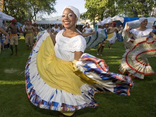 Paul Fraughton | The Salt Lake Tribune
Dancers  from Colombia's Grupo de Danzas Folklóricas Carmen López twirl and dance their way in the 