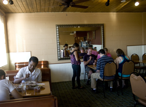 Kim Raff | The Salt Lake Tribune
Customers eat dinner at Thai Aroy-D in Salt Lake City, Utah on August 3, 2012.