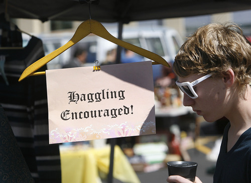 Scott Sommerdorf  |  Tribune file photo             
A casual sign suggesting a shopping strategy hubg at the Urban Flea Market opening in Salt Lake City in June. The marketplace is open the second Sunday of every month through October at 400 S. State St.