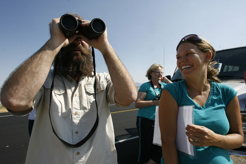 Scott Sommerdorf  |  The Salt Lake Tribune             
Jaimi Butler of Westminster College, right, leads a walking tour of the intricate and unique ecology of the Great Salt Lake, Saturday, August 11, 2012.