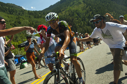 Chris Detrick  |  The Salt Lake Tribune
Fans cheer on bikers as they race up Little Cottonwood Canyon during Stage 5 of the Tour of Utah Saturday August 11, 2012. The 101.1 mile stage raced from Newpark Resort at Kimball Junction to Snowbird Resort.