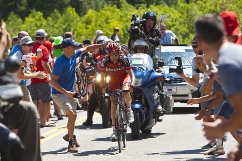 Chris Detrick  |  The Salt Lake Tribune
Fans cheer on Johann Tschopp, of BMC Racing Team, as he races up Little Cottonwood Canyon during Stage 5 of the Tour of Utah Saturday August 11, 2012. The 101.1 mile stage raced from Newpark Resort at Kimball Junction to Snowbird Resort.