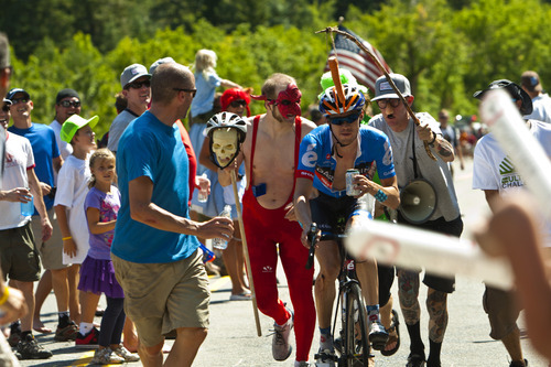 Chris Detrick  |  The Salt Lake Tribune
Fans cheer on a biker as he races up Little Cottonwood Canyon during Stage 5 of the Tour of Utah Saturday August 11, 2012. The 101.1 mile stage raced from Newpark Resort at Kimball Junction to Snowbird Resort.