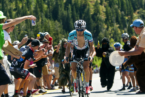 Chris Detrick  |  The Salt Lake Tribune
Fans cheer on a biker as he races up Little Cottonwood Canyon during Stage 5 of the Tour of Utah Saturday August 11, 2012. The 101.1 mile stage raced from Newpark Resort at Kimball Junction to Snowbird Resort.