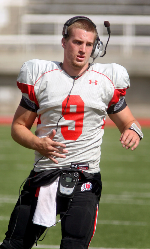 Steve Griffin | The Salt Lake Tribune


Utah quarterback Jon Hayes relays a play call during a scrimmage Aug. 9, 2012.