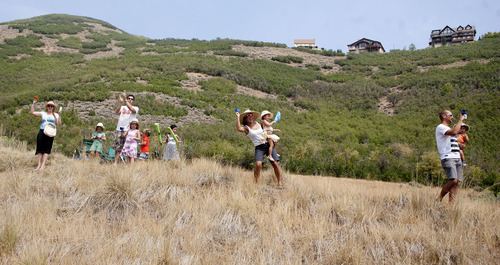 Jeremy Harmon  |  The Salt Lake Tribune

Spectators cheer from a hillside outside Heber during Stage 6 of the Tour of Utah on Sunday, August 12, 2012.