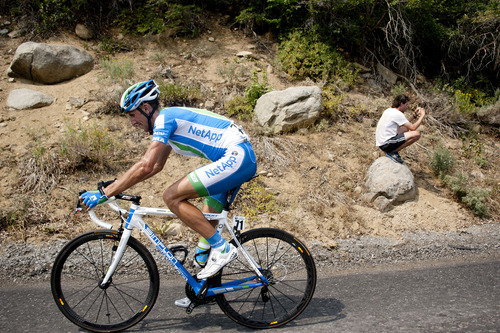 Jeremy Harmon  |  The Salt Lake Tribune

A rider passes a spectator during the final climb of Stage 6 of the Tour of Utah on Sunday, August 12, 2012.