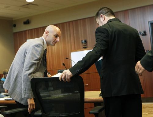 Al Hartmann  |  The Salt Lake Tribune  
Roberto Roman, right, enters Fourth District Court in Spanish Fork on Monday, Aug. 13 for jury selection for his murder trial.  His defense lawyer Jeremy Delicino at left.   Roman is accused of killing Millard County Deputy Josie Greathouse Fox.