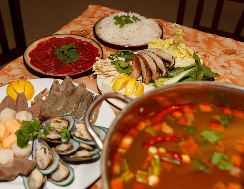 Trent Nelson  |  The Salt Lake Tribune
Saigon Hot Pot in West Valley City focuses on the Vietnamese hot pot cooking method where seafood, meats and fresh vegetables are cooked by boiling in flavorful broths right at the table.