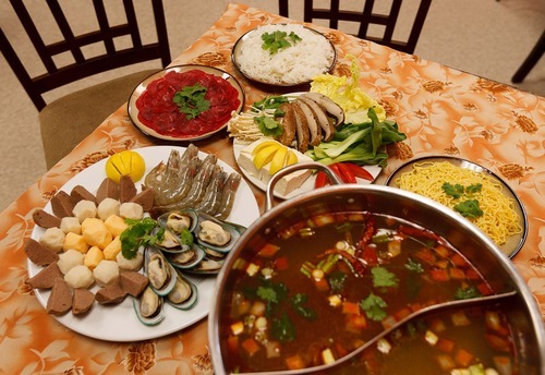 Trent Nelson  |  The Salt Lake Tribune
Saigon Hot Pot in West Valley City focuses on the Vietnamese hot pot cooking method where seafood, meats and fresh vegetables are cooked by boiling in flavorful broths right at the table..