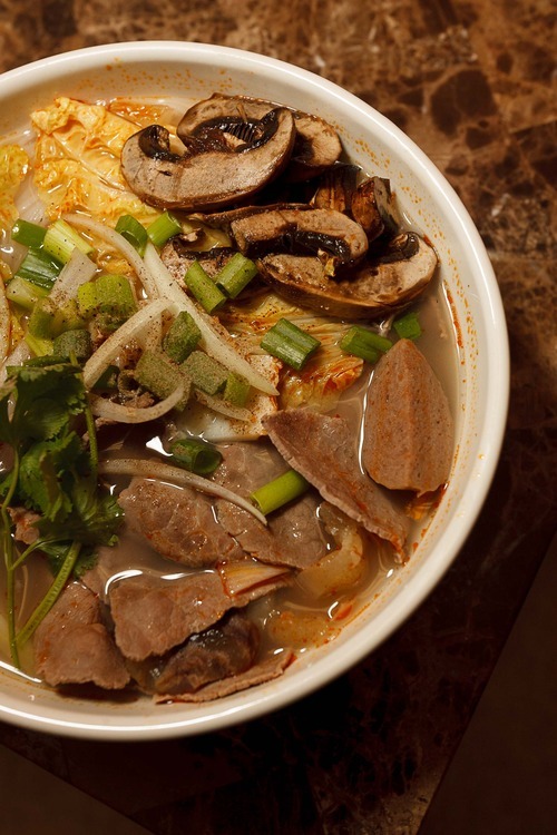 Trent Nelson  |  The Salt Lake Tribune
Noodles with beef tenderloin and vegetables at the Saigon Hot Pot restaurant in West Valley City.
