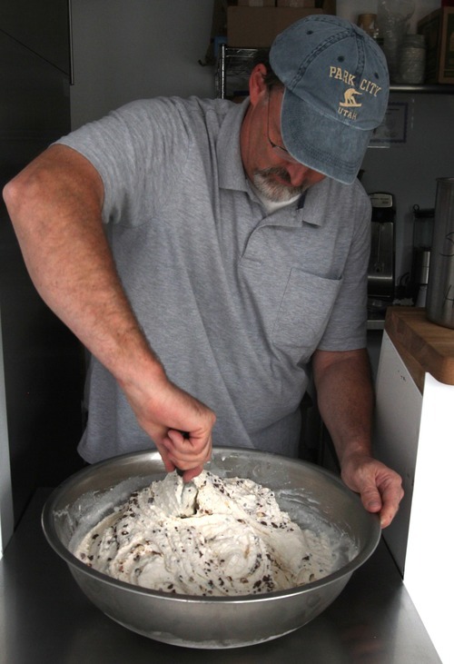 Rick Egan  | The Salt Lake Tribune 

Shawn Stuart stirs nuts and chocolate chips into a batch of ice cream at his shop, Ice Cream ConeUcopia, 26 E. 600 South, Salt Lake City.