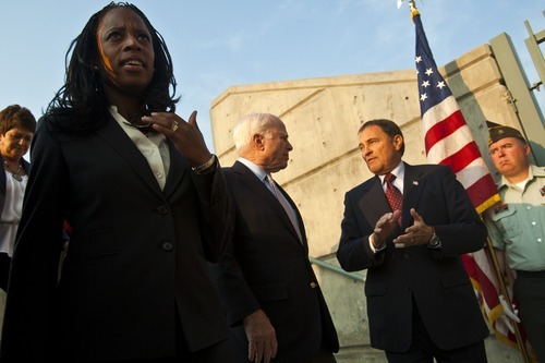 Chris Detrick  |  The Salt Lake Tribune
Mia Love, Sen. John McCain and Utah Governor Gary R. Herber talk during a rally for Mia Love at the Utah Cultural Celebration Center Thursday August 16, 2012.  John McCain spoke Thursday evening to a crowd of about 250 at a rally for the Love campaign, part of a swing through Western states by the 2008 Republican presidential nominee. Love is squaring off against Democratic Rep. Jim Matheson in the state's new 4th District Congressional District.