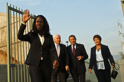Chris Detrick  |  The Salt Lake Tribune
Mia Love is introduced with Sen. John McCain and Utah Governor Gary R. Herber during a rally for Mia Love at the Utah Cultural Celebration Center Thursday August 16, 2012.  John McCain spoke Thursday evening to a crowd of about 250 at a rally for the Love campaign, part of a swing through Western states by the 2008 Republican presidential nominee. Love is squaring off against Democratic Rep. Jim Matheson in the state's new 4th District Congressional District.