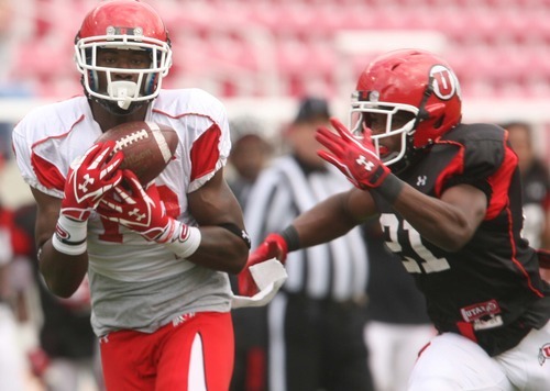 Leah Hogsten  |  The Salt Lake Tribune
Utes wide receiver DeVonte Christopher grabs the catch and pushes past Tyler White. University of Utah football team held their Spring red and white scrimmage Saturday, April 14 2012 in Salt Lake City at Rice Eccles Stadium.