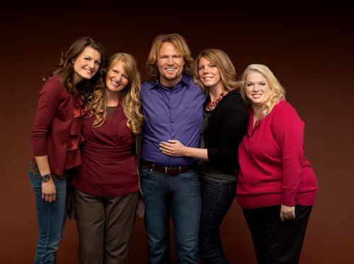 File photo | The Associated Press
Kody Brown poses with wives Robyn, Christine, Meri and Janelle in a promotional photo for the reality series 