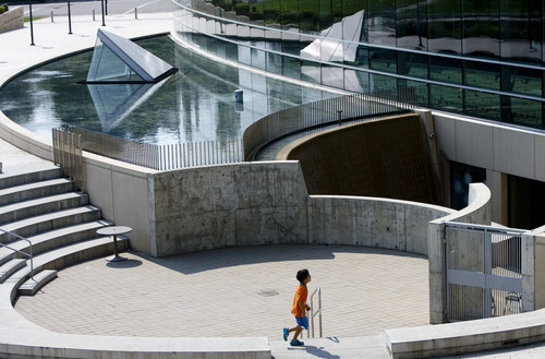 Kim Raff  |  The Salt Lake Tribune
A child runs through the amphitheater in Library Square in Salt Lake City. City officials recently visited Vancouver on the British Columbia coast to gain insight into urban vitality.