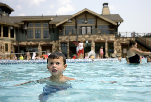 Kim Raff | The Salt Lake Tribune
Asher Moody swims in the Suncrest Community Pool in Draper, Utah on August 15, 2012. Asher's parents decided it would be best for him to start kindergarten at Summit Academy this month -- after he turned 6 on Aug. 1 -- rather than a year ago, when he'd barely turned 5 by the first day of school.