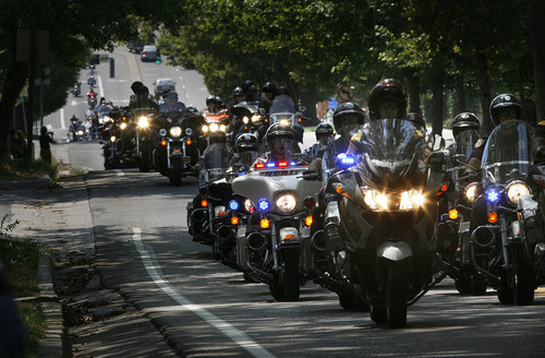 Scott Sommerdorf  |  The Salt Lake Tribune             
The front of the convoy of over 4,000 riders heads up State Street a block or so away from the state Capitol for a ceremony featuring a special tribute for fallen officers Agent Jared Francom and Trooper Aaron Beesley, Sunday, August 19, 2012.