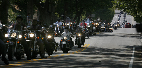 Scott Sommerdorf  |  The Salt Lake Tribune             
Riders stretched from 5400 South to the state Capitol as they rode to a ceremony at the State Capitol featuring a special tribute to fallen officers, Agent Jared Francom and Trooper Aaron Beesley, Sunday, August 19, 2012.