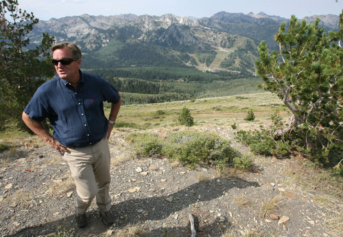 Steve Griffin | The Salt Lake Tribune


Mike Goar, managing director of Canyons Resort, stands high above Solitude Mountain Ski Resort, seen in background, on a ridge line that separates the two ski resorts Monday August 13, 2012. SkiLink is a proposed gondola that would be constructed, close to the area in this photograph, that would connect the two resorts.
