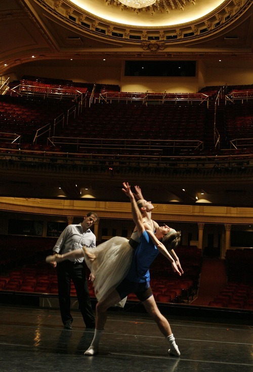 Ballet West's Adam Sklute works with dancers Katherine Lawrence and Michael Bearden during a 2008 rehearsal for the company's production of 